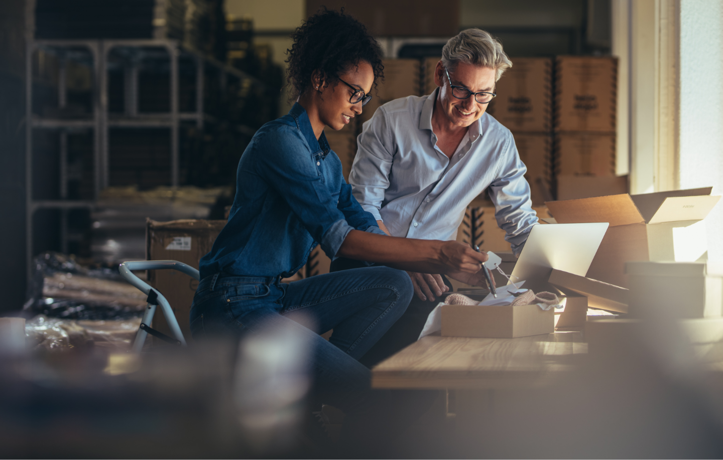 People working together over laptop