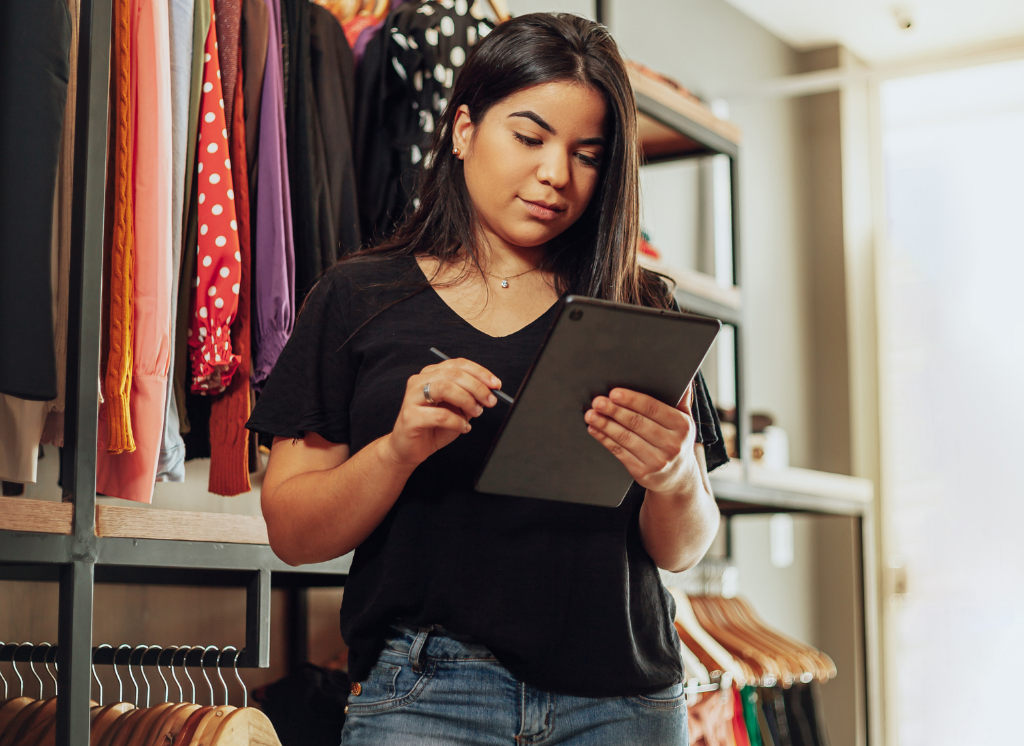 Woman working in clothing store