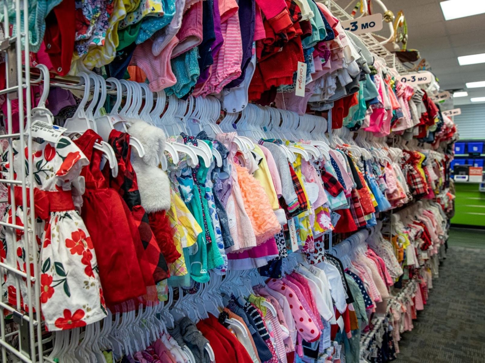 baby clothes on a rack