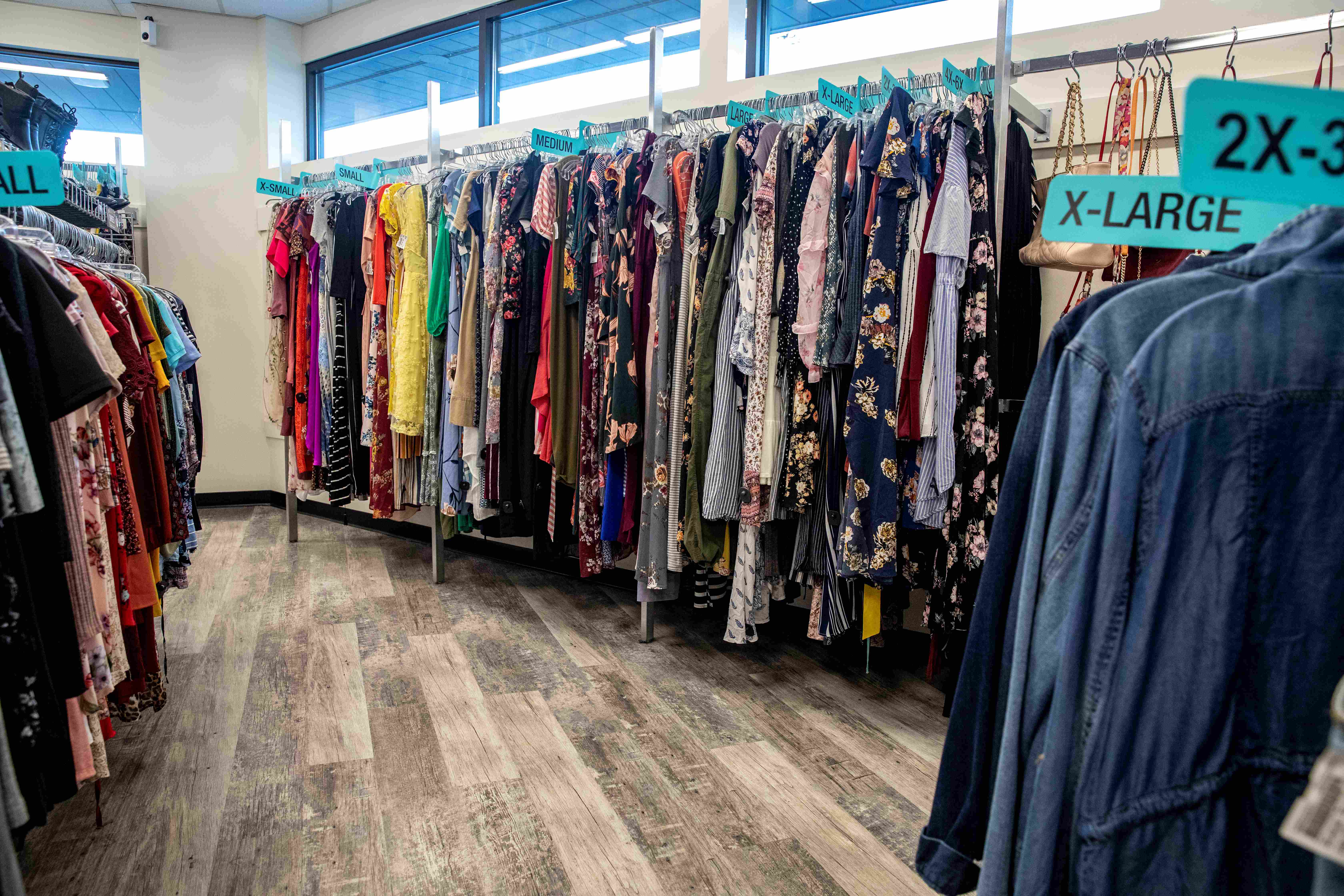 a rack of clothes displayed at a platos closest location